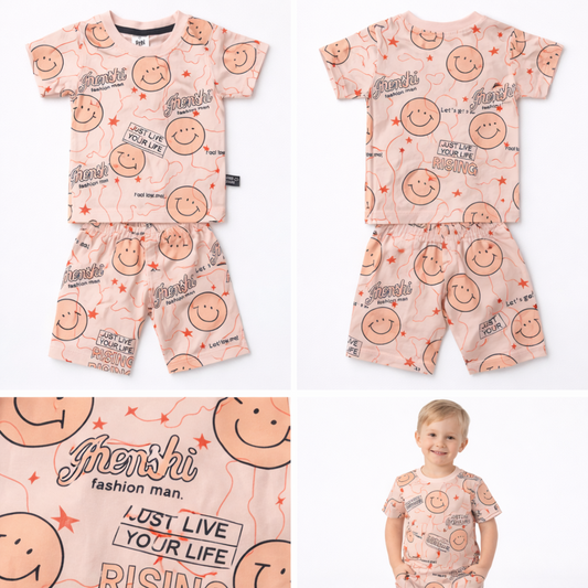 Children's pajama set with smiley face pattern and visible brand on a white background
