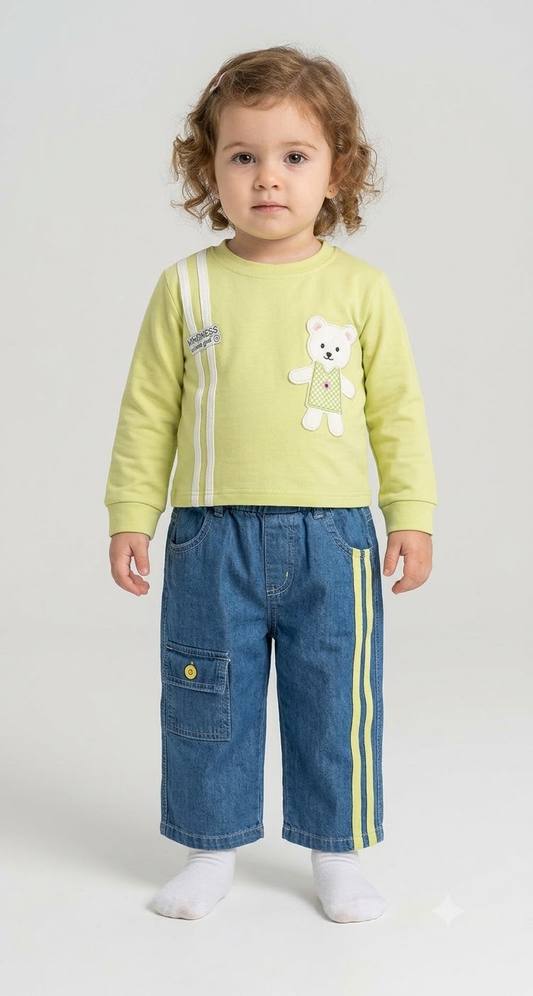 Toddler wearing lime teddy top and blue denim pants