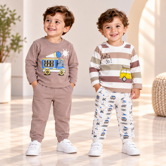 Two boys wearing taupe and striped vehicle graphic tops with coordinating joggers
