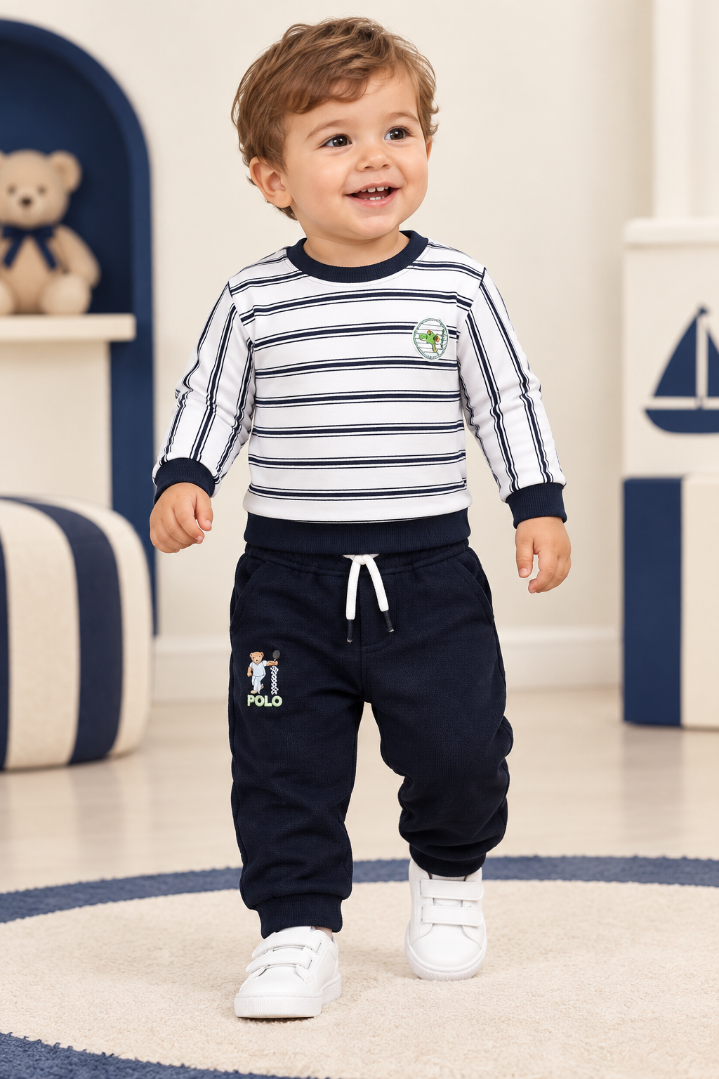 Toddler wearing white-and-navy striped long-sleeve T-shirt and navy pants